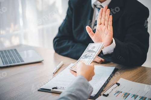 Preview: Dollar bills are not accepted as bribes by businesspeople.