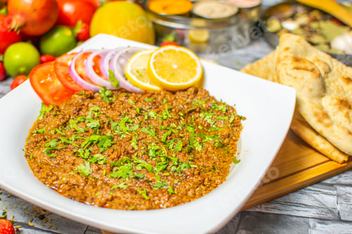 Preview: Seekh kabab Fry served in plate with Salad & Nan