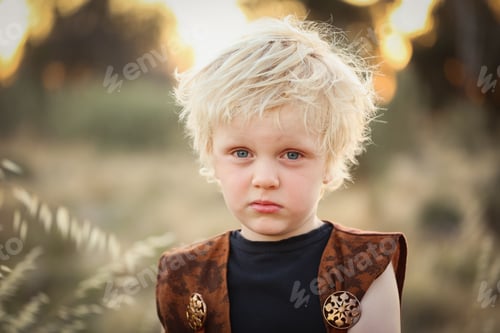 Preview: Shallow focus shot of a little blond hair boy