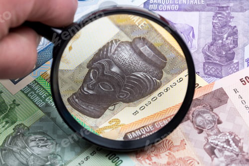 Preview: Congolese franc in a magnifying glass