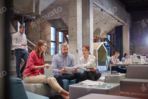 Preview: Business people having a informal meeting in communications pit