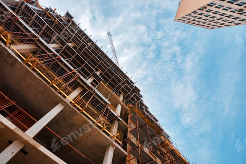 Preview: Building construction site with scaffolding