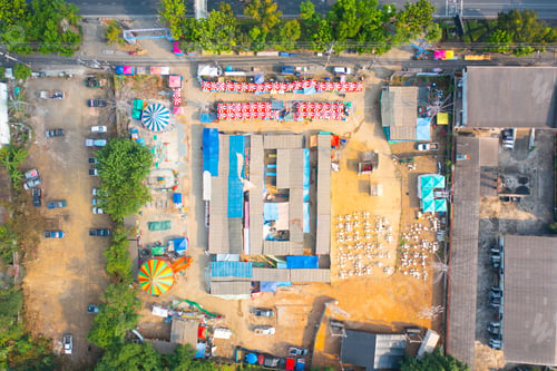 Preview: Aerial top view of Night Market people walking street, Colorful tents. Retail shops