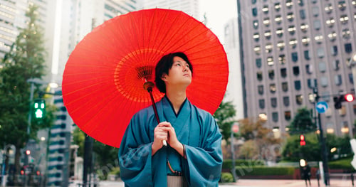 Preview: Kimono, umbrella and vision with Japanese man in city for traditional ceremony, thinking and cultur