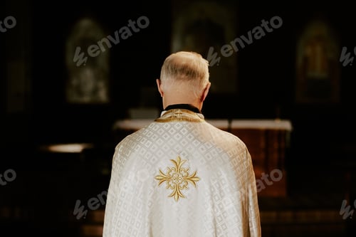 Preview: Unrecognizable Senior Priest Standing In Church