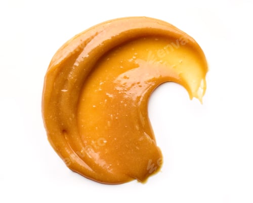 mancha de caramelo sobre fondo blanco