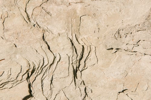 Preview: full frame shot of layered stone surface for background