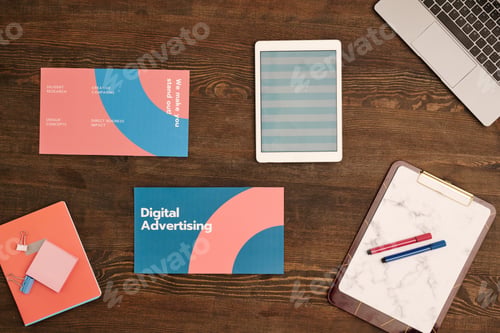 Preview: Top view of laptop keypad, digital tablet with striped pattern and documents