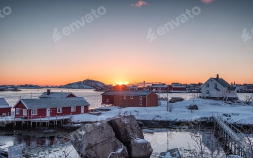 Preview: Colorful fishing village of reine town on coastline in winter at sunrise