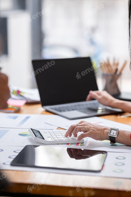 Preview: Businesswoman working at office with documents on desk, doing planning analyzing the financial repor