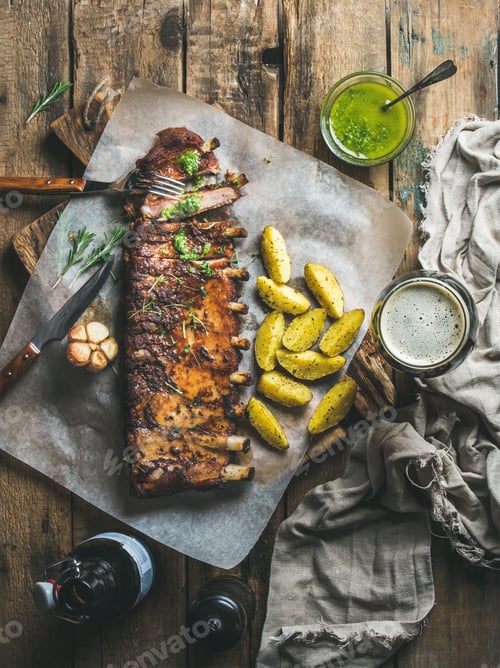 Preview: Roasted pork ribs with spices, fried potato and dark beer
