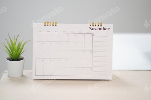 Preview: Desk calendar for November on the table with copy space concept