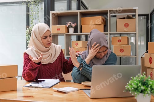 Preview: Stressed two friend muslim female work online business feeling upset and unhappy about the online