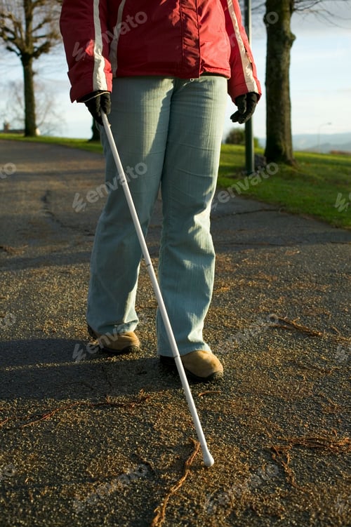 Preview: Blind woman using a cane