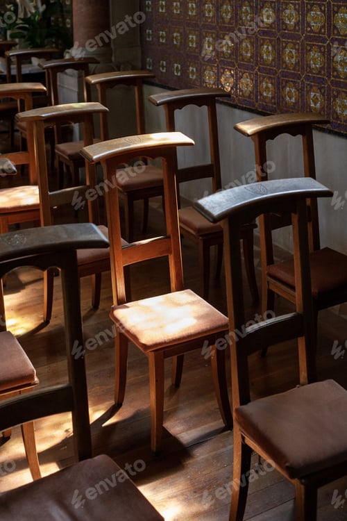 Preview: Vertical shot of chairs in a church in the Eiffel region, Germany