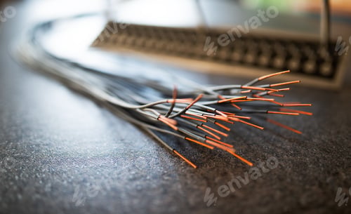 Preview: Bundle of cut thin wires with red connections