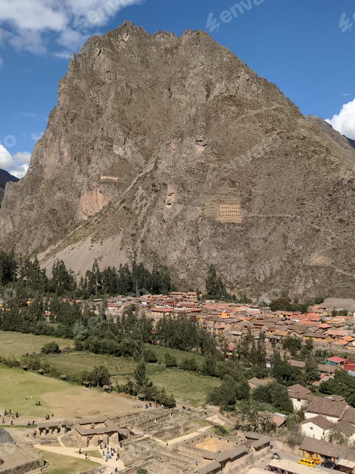 Preview: this is a valley and the mountains behind it, with houses on the bank and