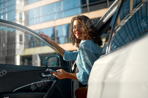 Preview: Woman near car on the street