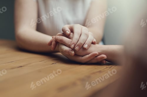 Preview: Im here for you always. Cropped shot of two people holding hands in comfort.