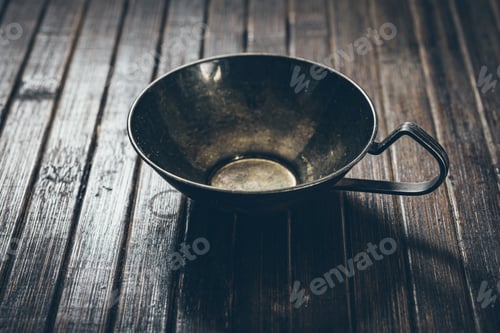 Preview: Low Key Photography- Metal Coffee Cup On Wooden Background