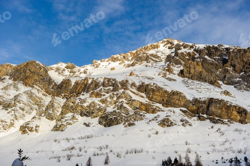 Preview: Alpine winter mountain landscape. French Alps with snow.