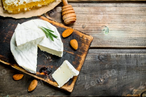 Preview: Brie cheese with honey and nuts.