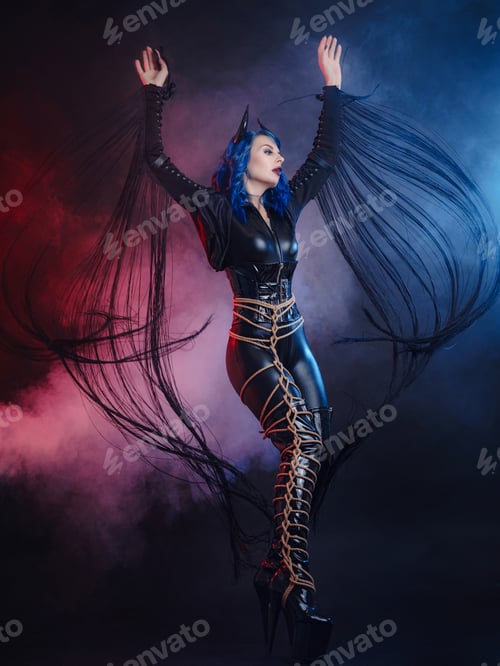 Preview: happy halloween, woman in devil costume