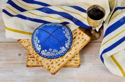 Preview: In connection with the Jewish holiday of Passover, a cup of kosher kiddush wine and an unleavened