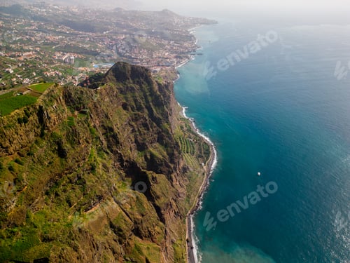 Preview: Scenic coastal landscape featuring cliffs and tranquil waters. Madeira, Portugal