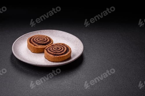 Preview: Freshly baked cinnamon roll with spices and cocoa filling