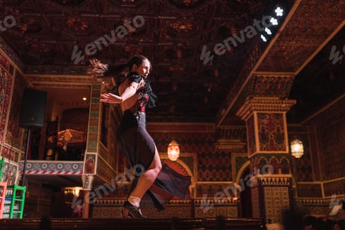 Preview: Woman in dress dancing flamenco on scene