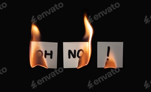 Preview: Small three papers with "OH NO!" burning on a black background