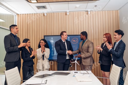Preview: Group of professional business people are working and shaking hands while working.