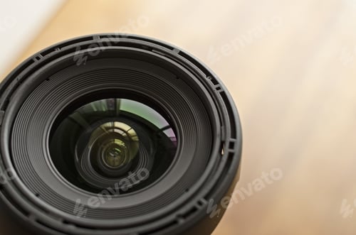 Preview: Closeup shot of the lens of a modern camera
