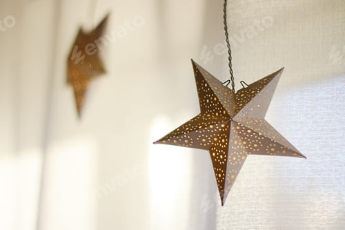 Preview: decorations for the holiday. white paper stars.background for Christmas and new year holidays.