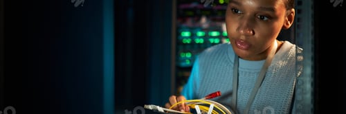 Preview: African American Woman Working in Data Center