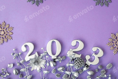 Preview: Lilac Christmas background with numbers 2023 and decor details, flat lay.