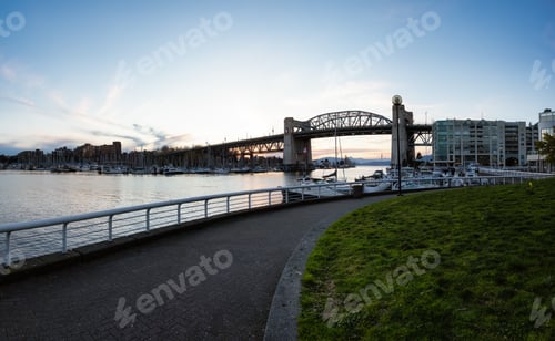Preview: Panoramic View of False Creek, Burrard Bridge, Boats in Marina in a modern city during sunset
