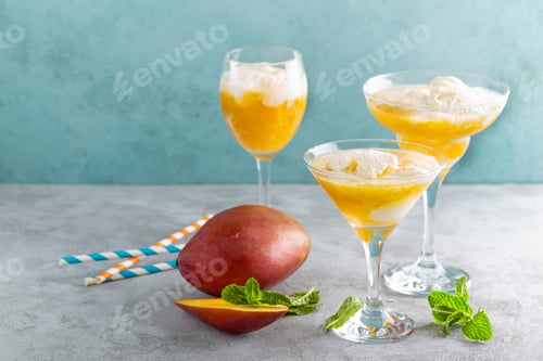 Preview: Refreshing summer mango cocktail with fresh juice and ice cream