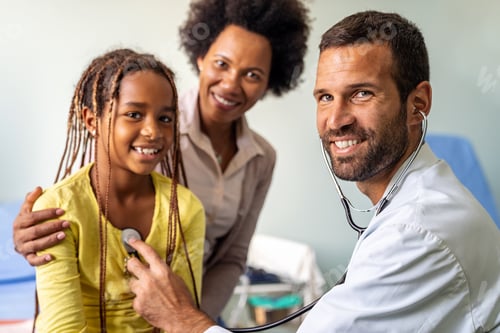 Preview: Doctor examines a child with stethoscope in examination room. Healthcare people children concept