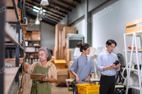 Preview: Mother, son and daughter are working at their DIY store.