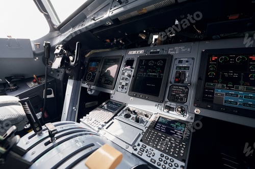 Preview: Display with information. Close up focused view of airplane cockpit