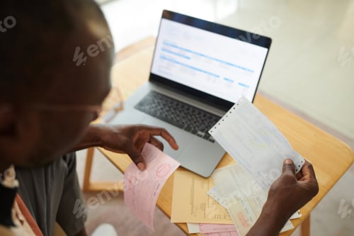Preview: Man Checking Utility Bills