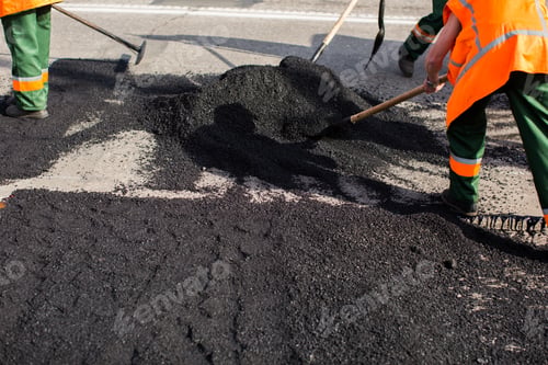 Preview: Workers on Asphalting paver machine during Road street repairing works.