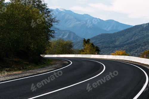 Preview: Road on the background of beautiful mountains in the Caucasus. Landscapes of the country