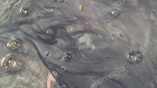 Preview: Liquid metallic substanse background. Beautiful light purple liquid background with flowing bubbles