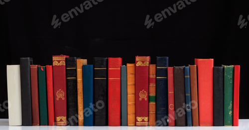 Preview: Vintage books on black background