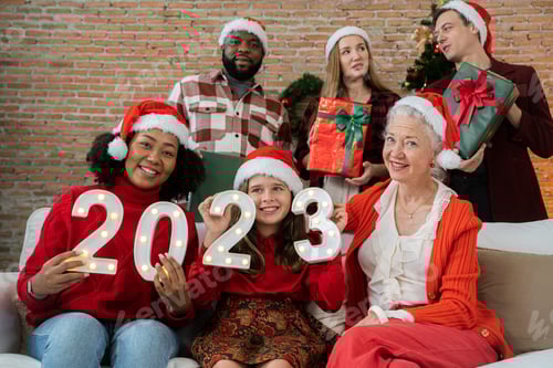 Preview: Happy family having fun on Christmas morning, Decorating the house.