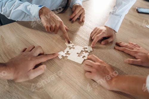 Preview: Top view of office workers that are playing puzzle game, conception of success