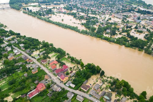 Preview: Aerial view of Dnister river with dirty water and flooded houses in Halych town, western Ukraine.